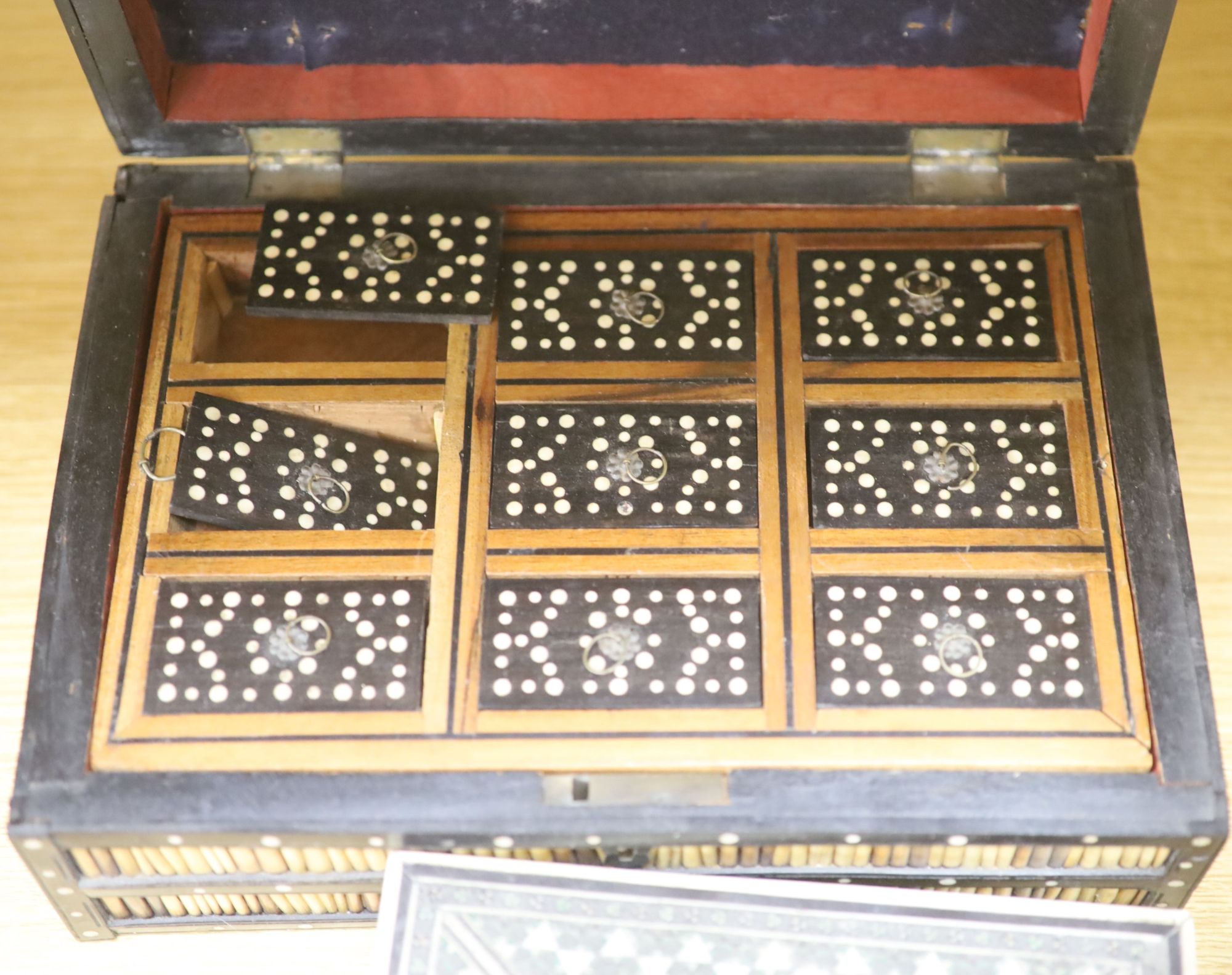 Four Ceylonese quillwork boxes, early 20th century, largest 28 x 19 x 10cm, an Indian inlaid box a Victorian rosewood sewing box